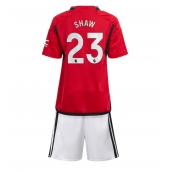 Maillot de football Réplique Manchester United Luke Shaw #23 Domicile Enfant 2023-24 Manche Courte (+ Pantalon court)